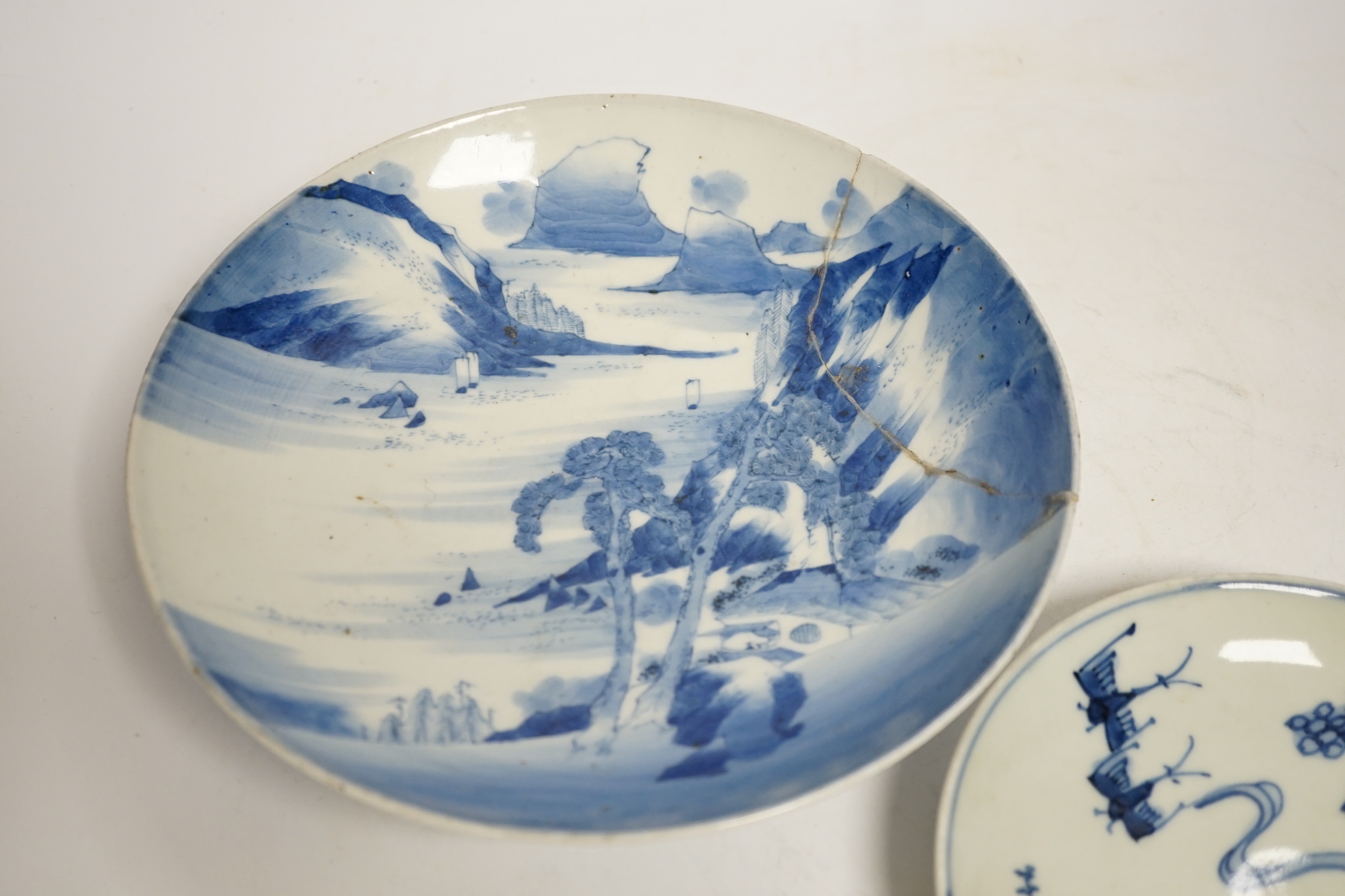 Two Japanese blue and white plates, largest 22cm in diameter